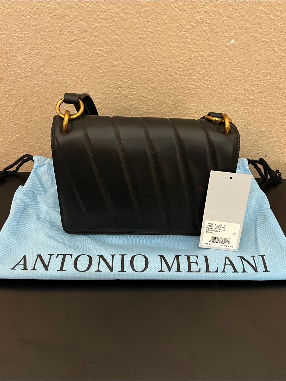 ANTONIO MELANI Black Quilted Shoulder Bag with Gold Rings